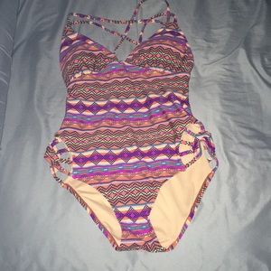 One piece bathing suit.... used only once